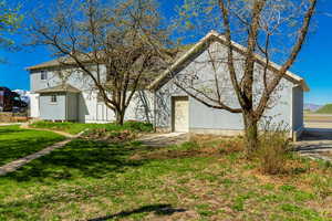 View of front of home featuring a front lawn