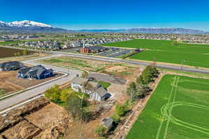Birds eye view of property featuring a mountain view and a residential view