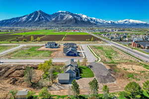 Birds eye view of property featuring a residential view and a mountain view