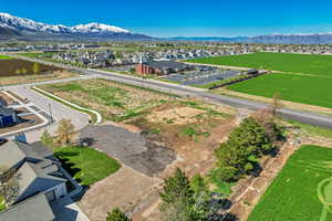 Drone / aerial view featuring a mountain view and a residential view