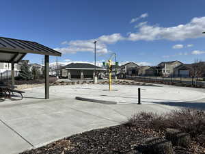 View of community featuring a gazebo, fence, and a residential view