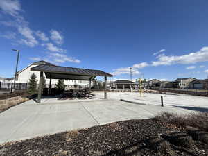 View of property's community featuring a gazebo and fence