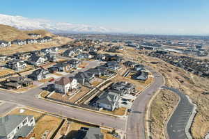 Drone / aerial view featuring a residential view and a mountain view