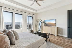 Bedroom with recessed lighting, a ceiling fan, baseboards, and wood finished floors