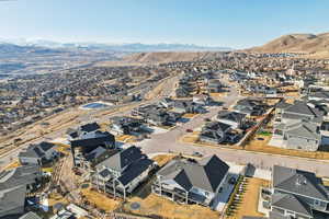 Drone / aerial view featuring a residential view and a mountain view