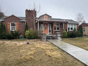 Front Elevation - fully renovated with stone  and cheery accents