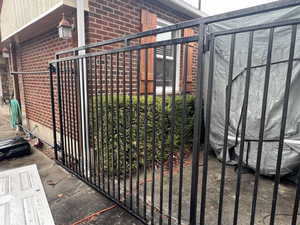 Gate to backyard and garage.