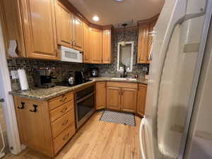 Kitchen microwave and range view.