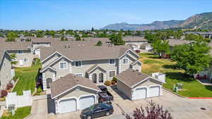 Aerial view featuring a mountain view and a residential view