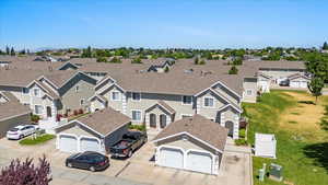 Birds eye view of property with a residential view