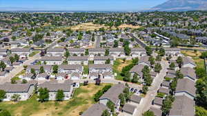 Birds eye view of property with a residential view