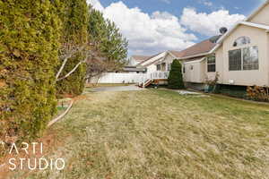 View of yard with fence