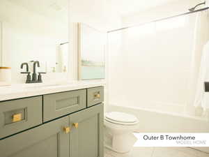 Full bathroom featuring visible vents, toilet, shower / tub combo with curtain, and vanity