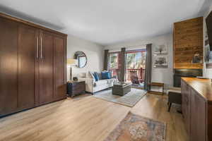 Living area with light wood-style floors