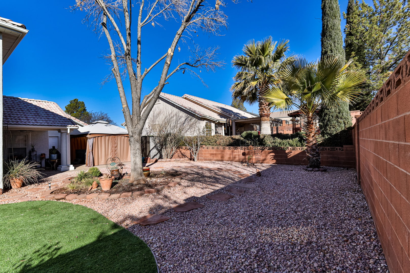 View of yard with a patio and a fenced backyard