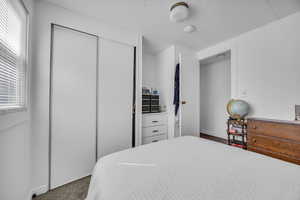 Bedroom featuring a closet