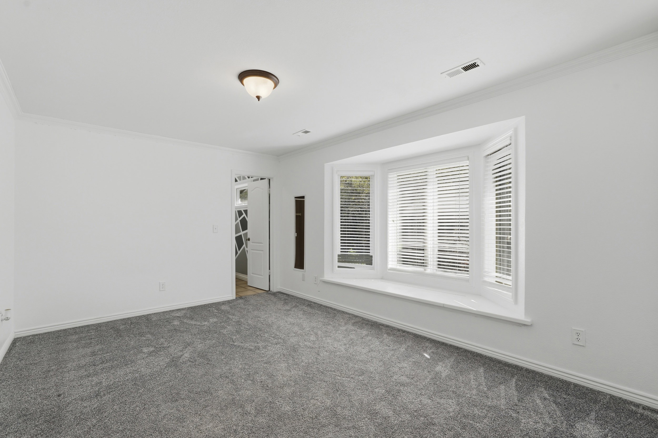 Bedroom with bathroom entrance