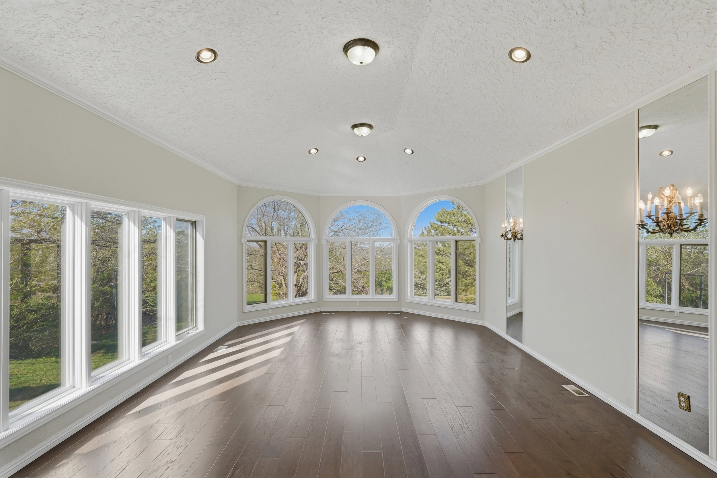 Large front living room with oversized windows