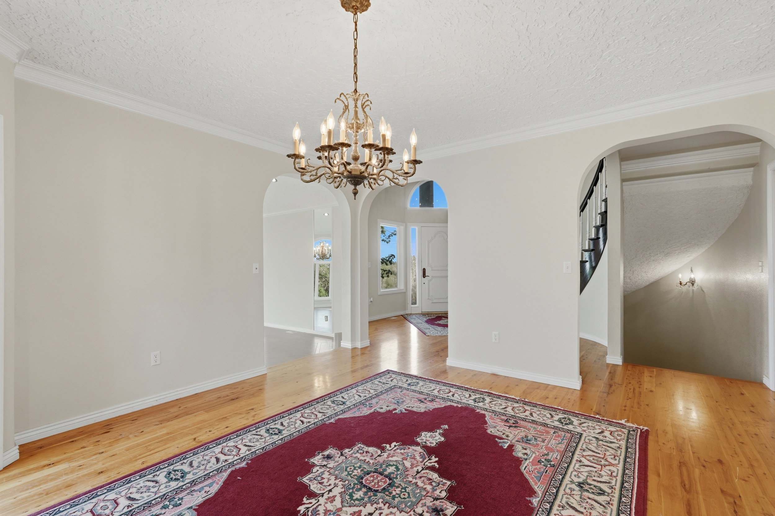 Formal dining room with entrance to kitchen, living room, and foyer