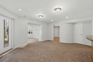 Open space between living room and second kitchen
