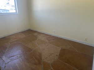 Second bedroom and stone finish floor