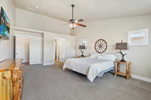 Bedroom featuring visible vents, baseboards, and carpet