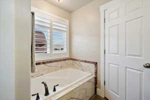 Bathroom featuring a garden tub