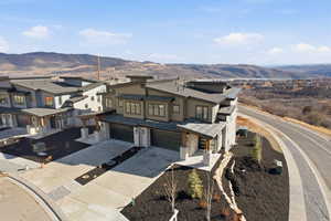 View of subject property featuring mountains