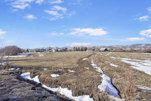 View of yard with a mountain view