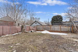 View of yard featuring a fenced backyard