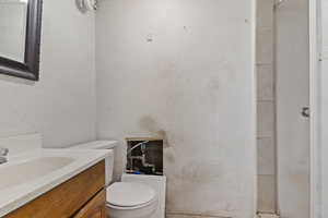 Bathroom featuring toilet and vanity