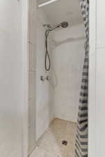 Bathroom with a shower with curtain