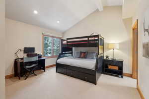 Bedroom with lofted ceiling with beams, carpet floors, recessed lighting, and baseboards