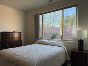 Bedroom with visible vents