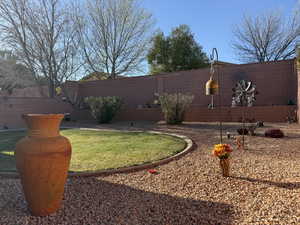 View of yard with a fenced backyard