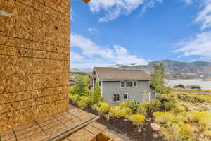 View of property exterior with a mountain view