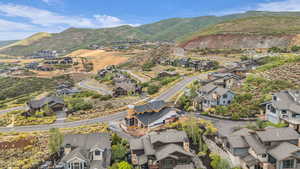 Aerial view of residential area with a mountain backdrop