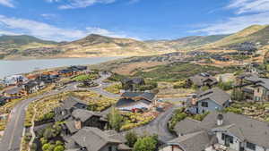 Aerial view of residential area with a water and mountain view