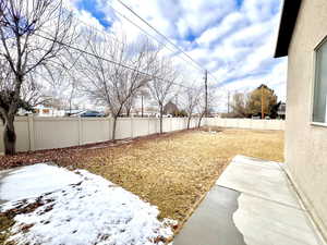 View of yard featuring a fenced backyard