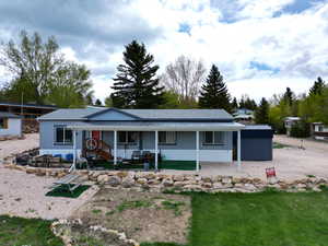 View of front of home featuring covered porch