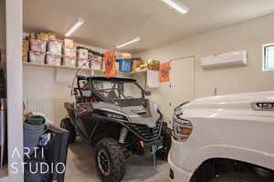 Garage featuring 2 car deep parking and outside man door