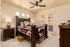 Bedroom #4 featuring french doors, ceiling fan, and access to outside