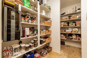 Storage area featuring beverage cooler