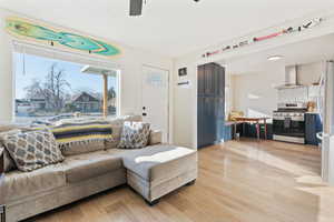 Living area featuring light wood finished floors