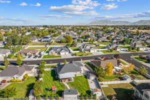 Drone / aerial view featuring a mountain view and a residential view