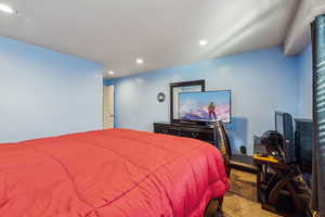 Bedroom featuring recessed lighting and carpet