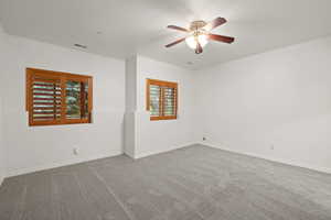Lower level large bedroom with new carpet and paint