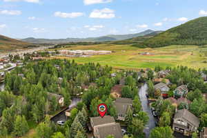 Aerial perspective of suburban area with mountains
