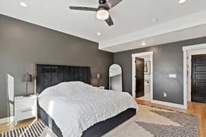 Bedroom featuring recessed lighting, baseboards, and light wood-style flooring