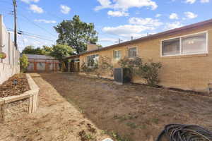 View of fenced backyard
